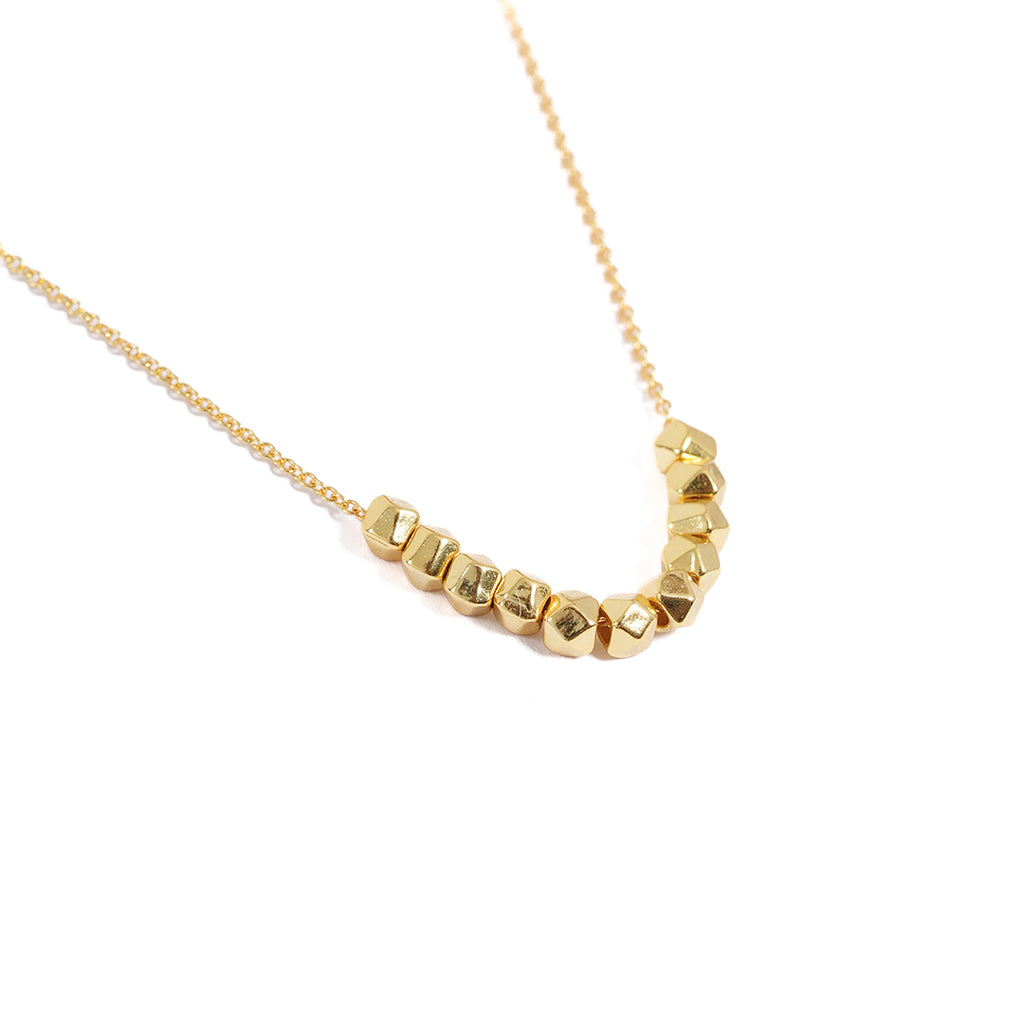 Close up image gold plated chain